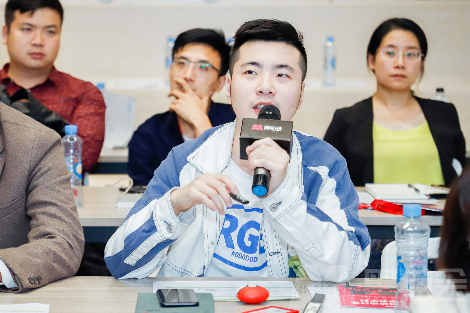 學員在活動執行分享會與講師討論